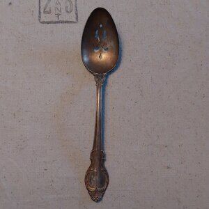Vintage Holmes & Edwards deepsilver slotted serving spoon